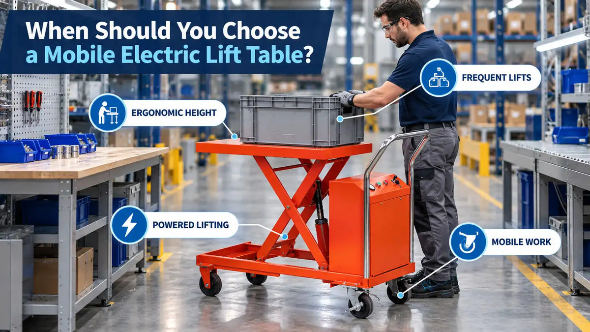Mobile electric scissor lift table raising a parts bin to ergonomic working height in an industrial assembly area.